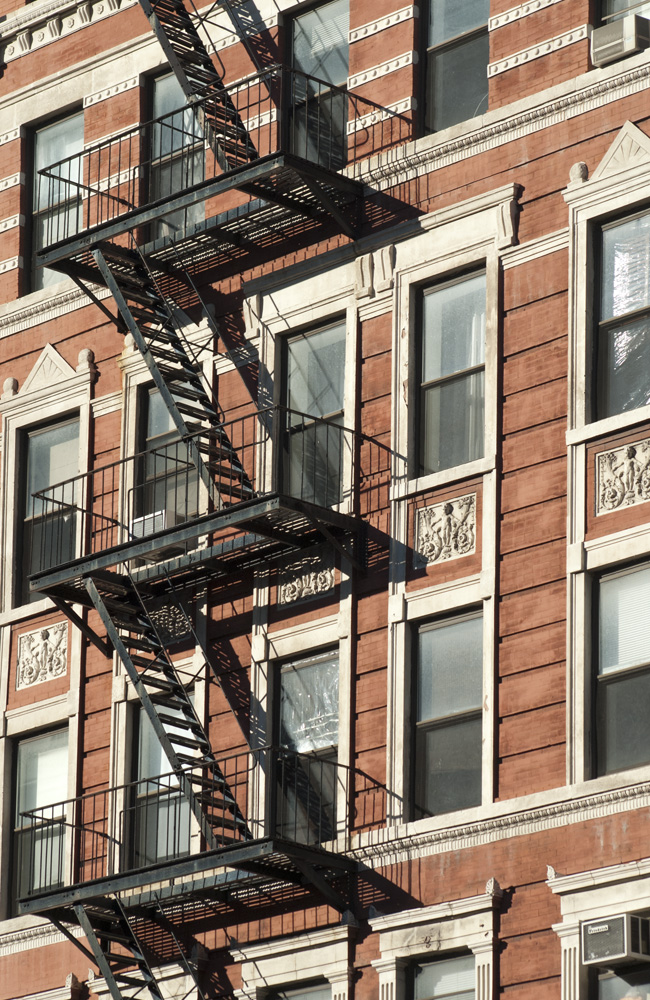 A wrought-iron fire escape in New York City, US.